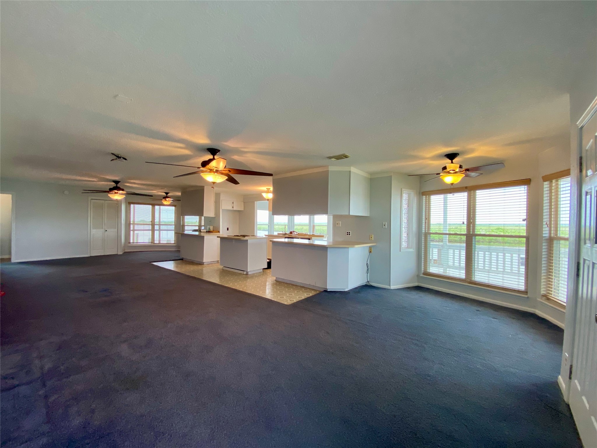 102 Redfish Drive Freeport, TX 77541 - Photo 5 of 44 a view of a livingroom with a ceiling fan and window