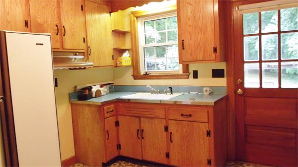 9 Patton Road Salem, MA 01970 - Photo 5 of 12 a bathroom with a sink a mirror and a window