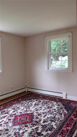 9 Patton Road Salem, MA 01970 - Photo 7 of 12 a room with a rug