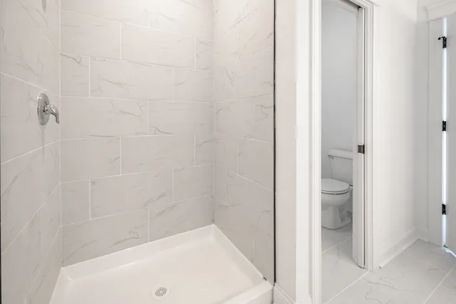 a bathroom with a white bath tub