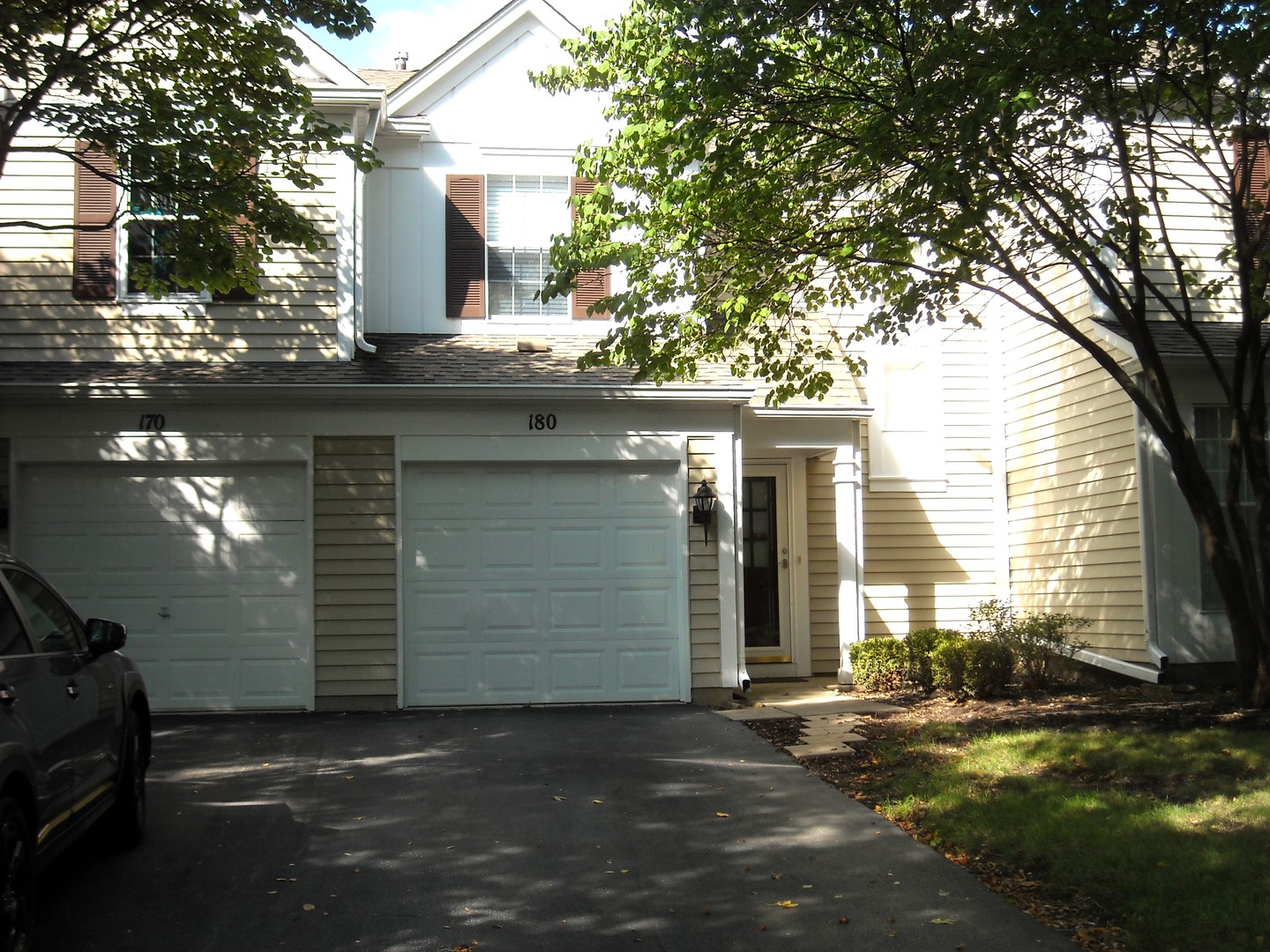 Undisclosed Address Aurora, IL 60504 - Photo 1 of 12 a view of a house with a yard