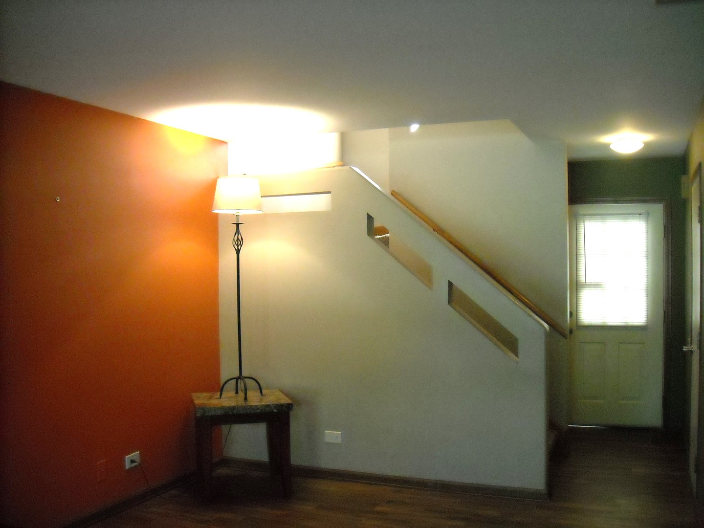 Undisclosed Address Aurora, IL 60504 - Photo 3 of 12 a view of hallway with stairs