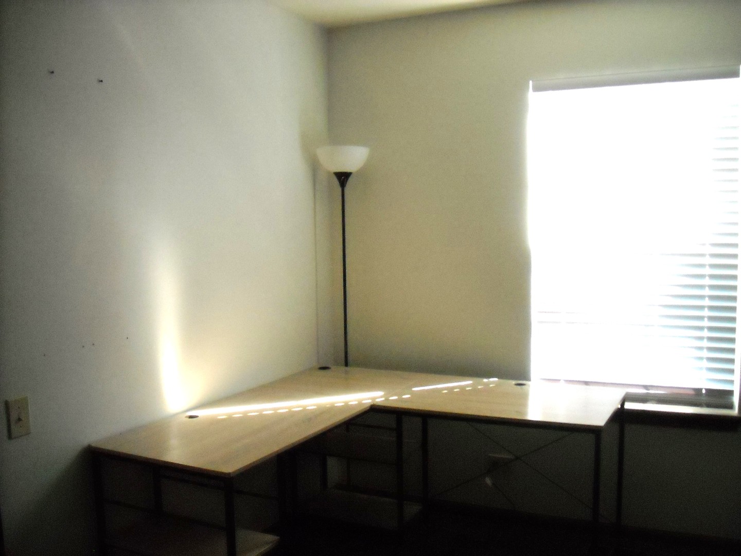 Undisclosed Address Aurora, IL 60504 - Photo 5 of 12 a room with a table and chairs