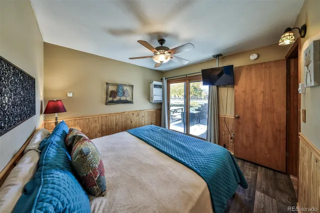 a bed room with a bed and a window