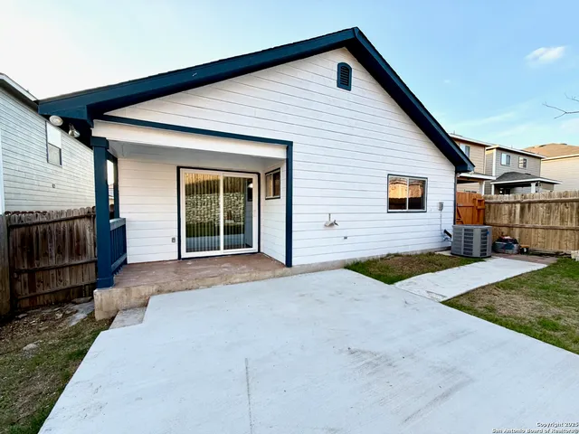 a front view of a house with garage
