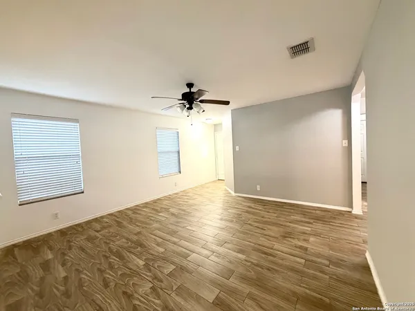 a view of an empty room and window