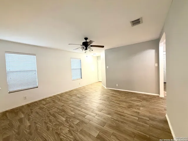 a view of an empty room and window