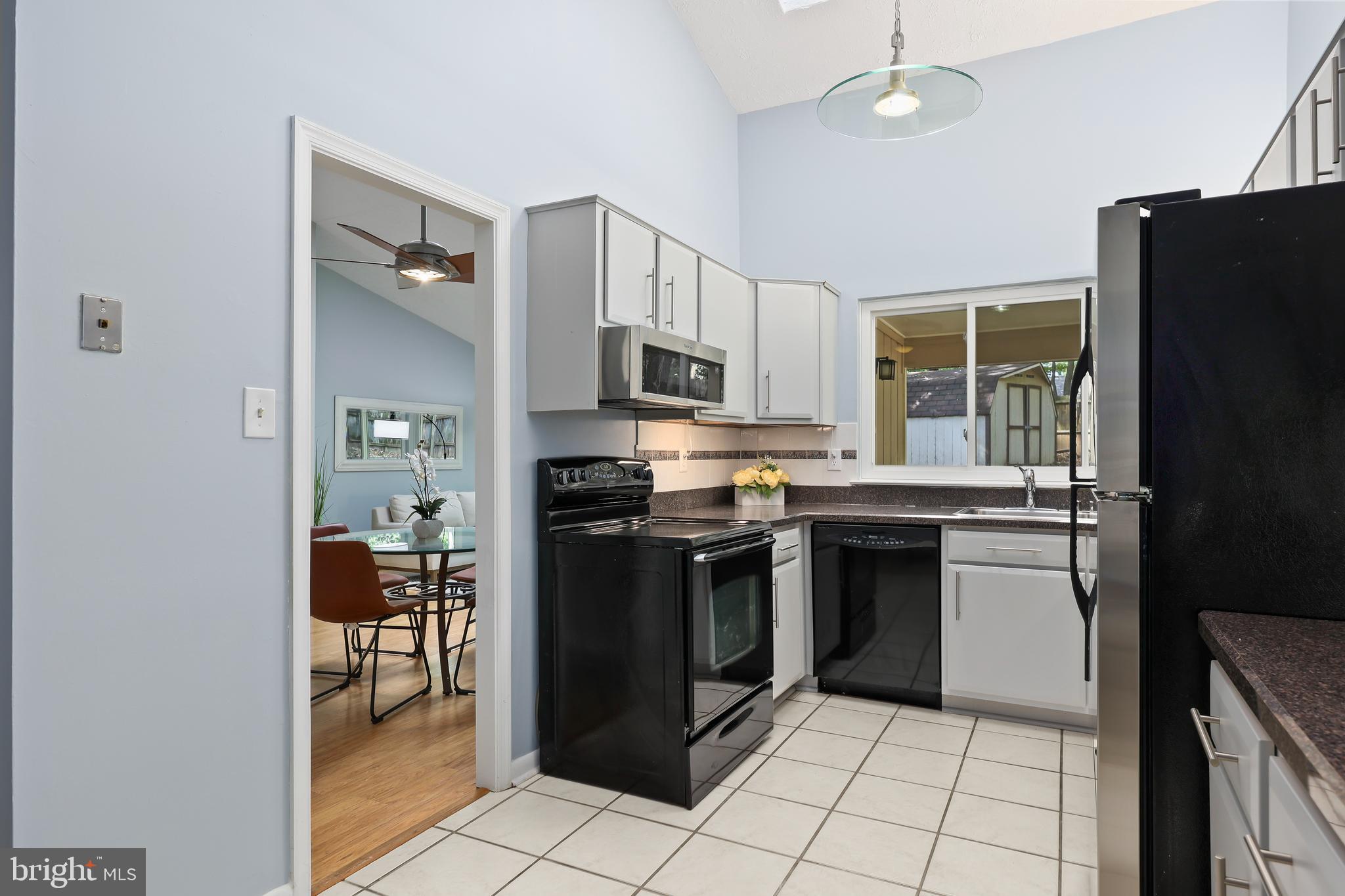 5344 Aylor Road Fairfax, VA 22032 - Photo 7 of 30 Kitchen flows between family room and living room