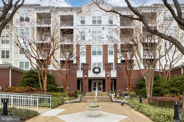 a front view of a building with street view