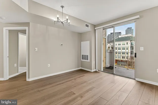 a bathroom with a sink toilet a mirror and shower