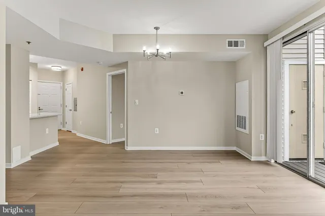 a view of a balcony with wooden floor