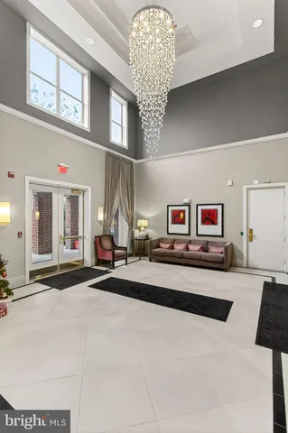 a kitchen with stainless steel appliances granite countertop a refrigerator sink and cabinets