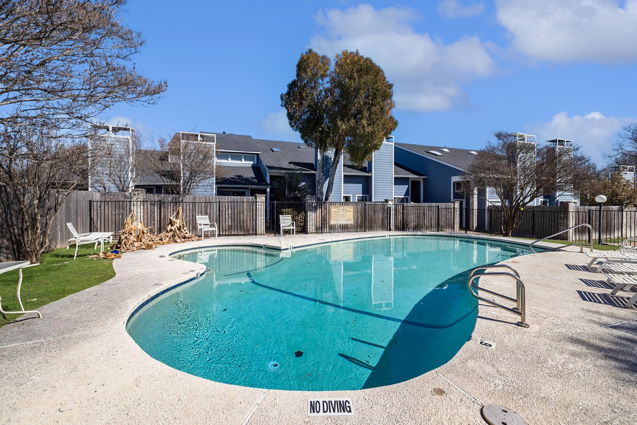 1010 West Rundberg Lane, Unit 30 Austin, TX 78758 - Photo 26 of 30 a view of a swimming pool with a patio