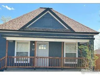 a large bathroom with a sink and a large mirror