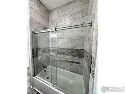 a view of a hallway with windows