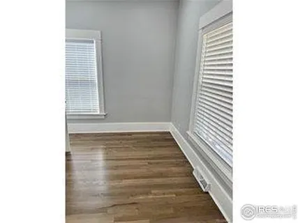 a view of a house with a yard and garage