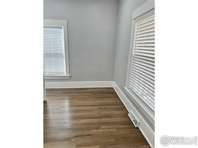a view of a house with a yard and garage