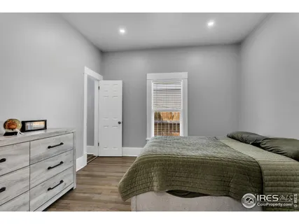 a kitchen with granite countertop a sink and cabinets