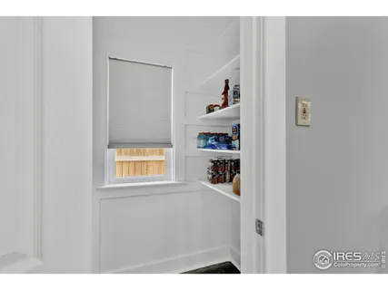 a bathroom with a sink vanity granite and a mirror