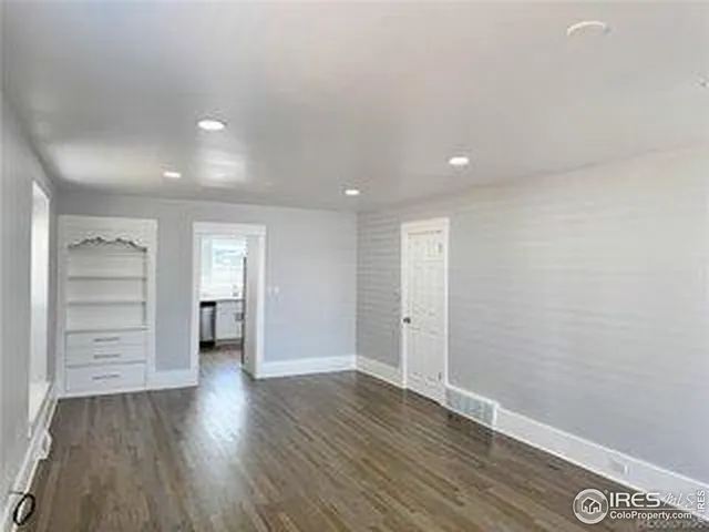 a bathroom with a sink a mirror and a shower