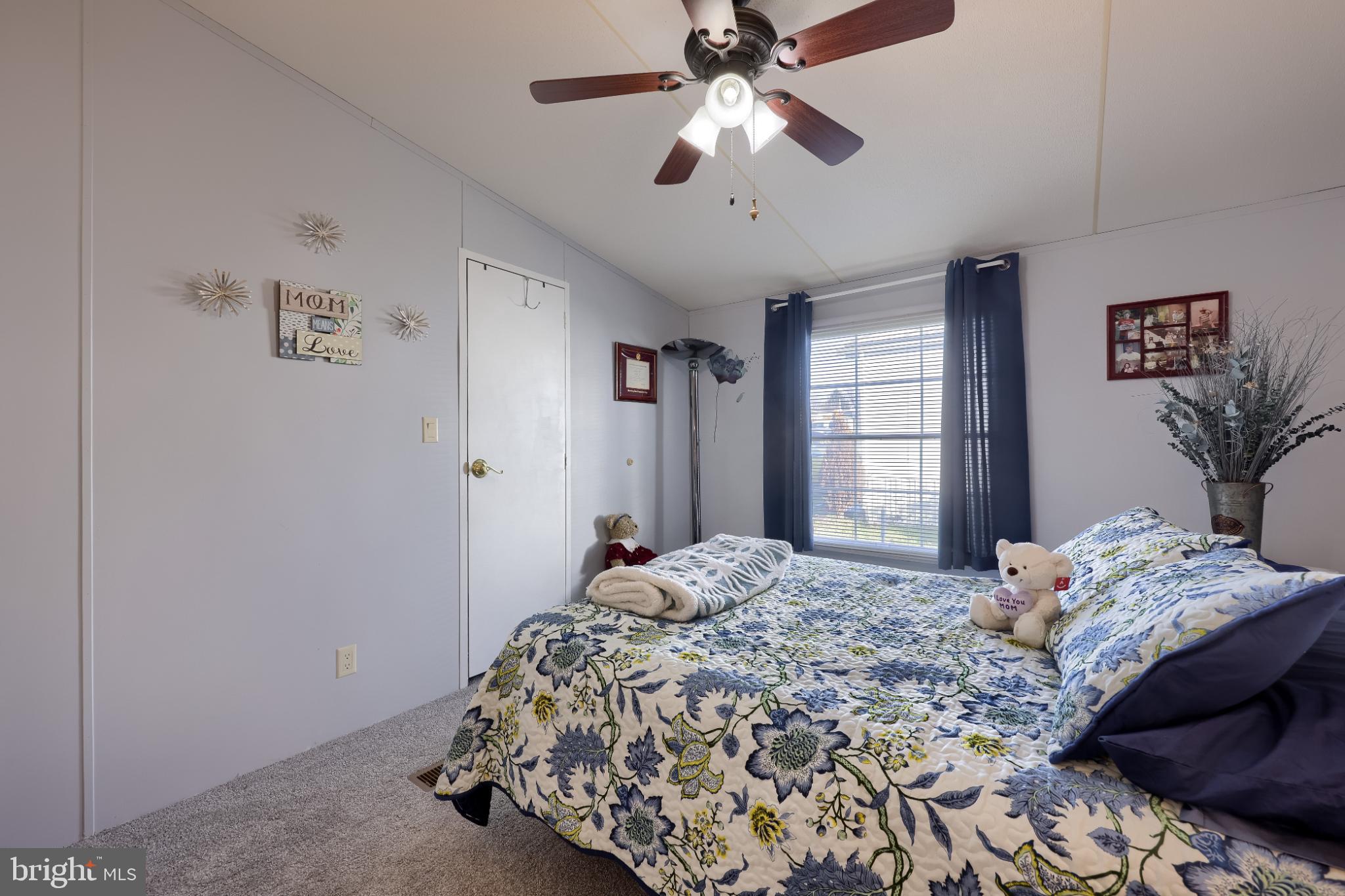 104 Fox Run Court Lancaster, PA 17603 - Photo 13 of 17 a bedroom with a large bed and a window