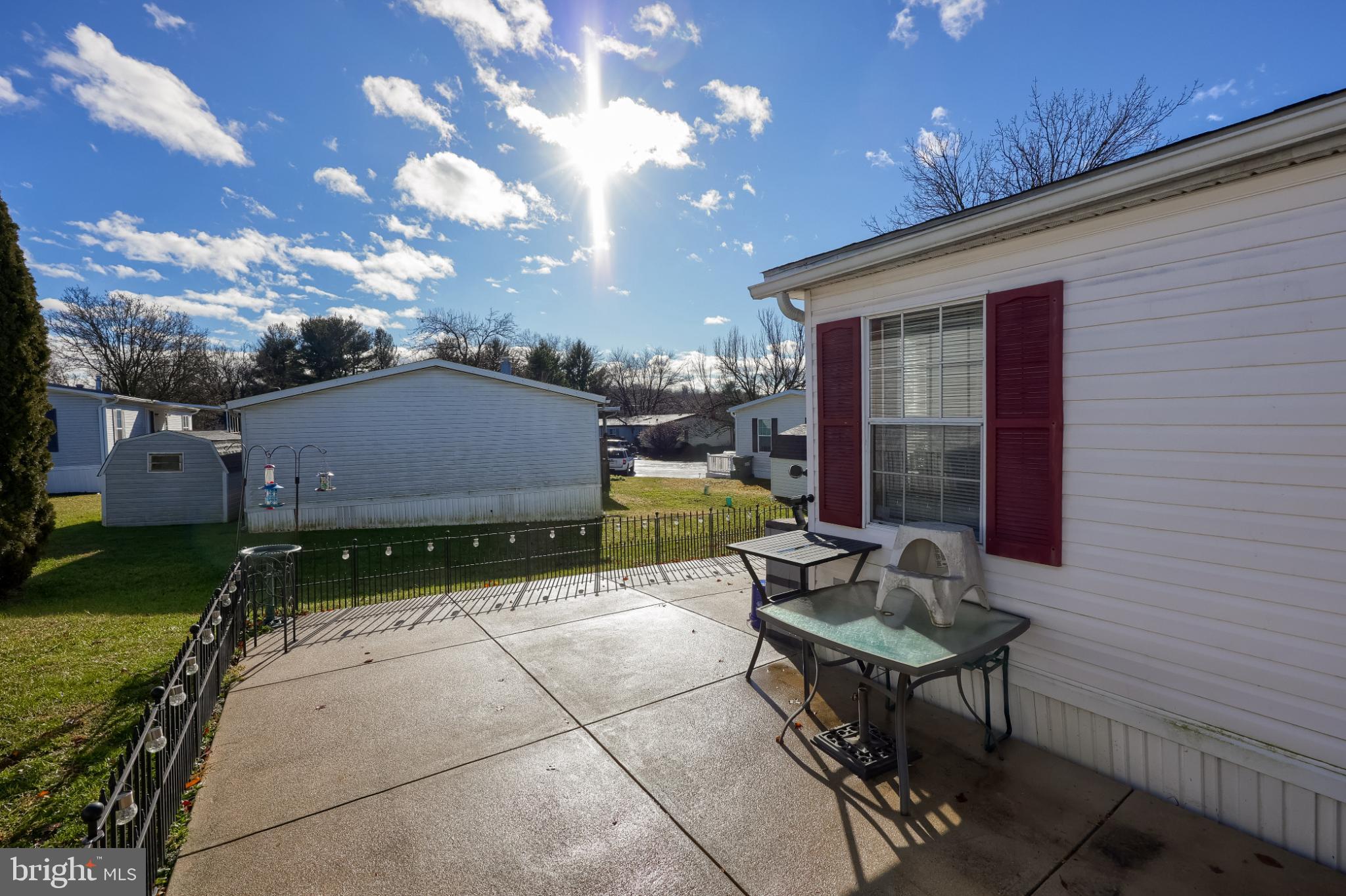 104 Fox Run Court Lancaster, PA 17603 - Photo 2 of 17 a backyard of a house with table and chairs