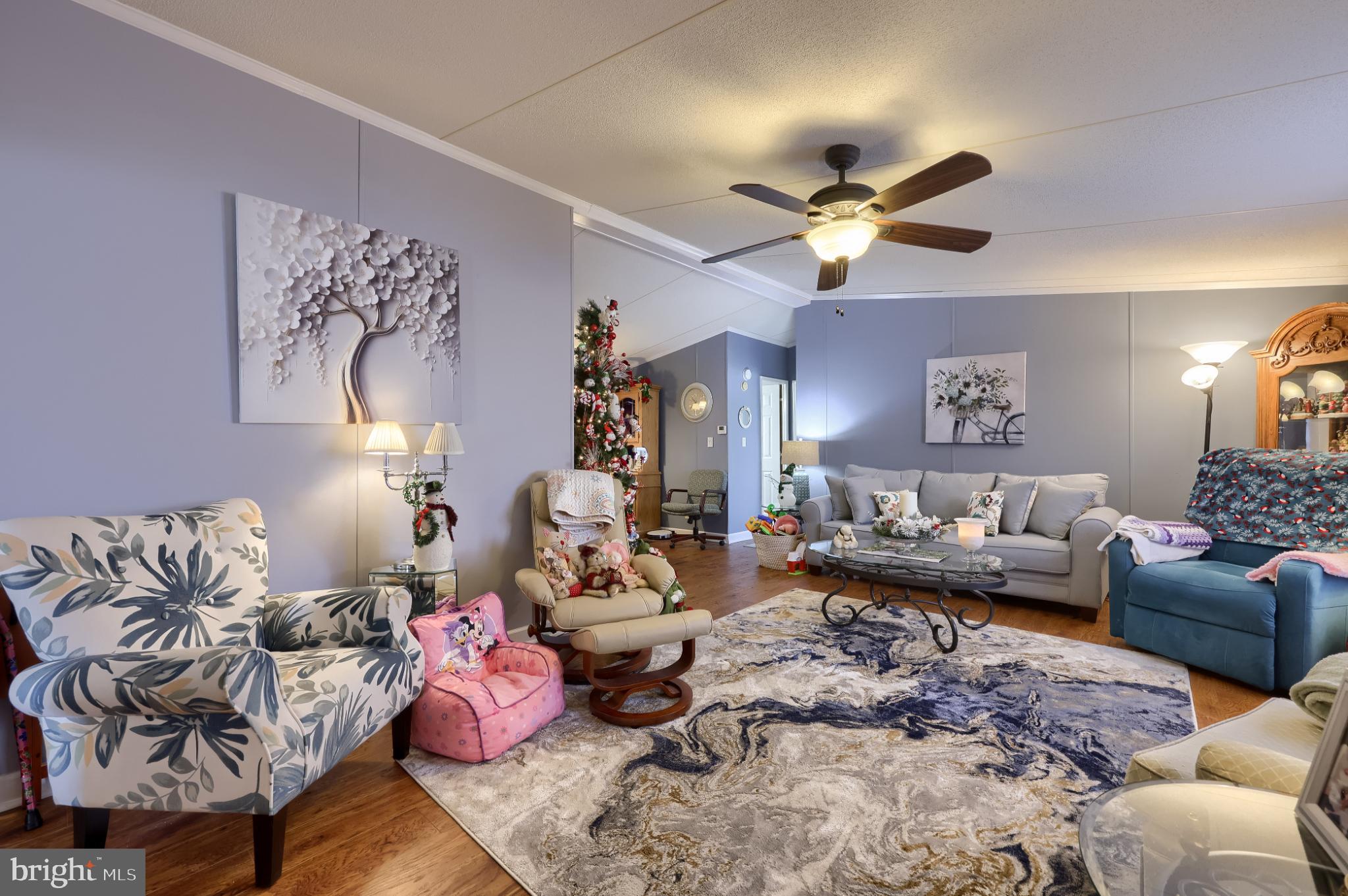 104 Fox Run Court Lancaster, PA 17603 - Photo 5 of 17 a living room with furniture and a chandelier