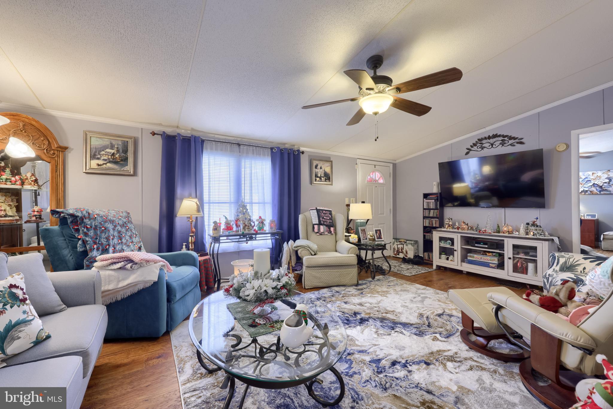 104 Fox Run Court Lancaster, PA 17603 - Photo 6 of 17 a living room with furniture and a flat screen tv