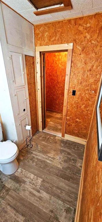 604 West 11th Street Quanah, TX 79252 - Photo 12 of 18 a bathroom with a toilet sink and a shower