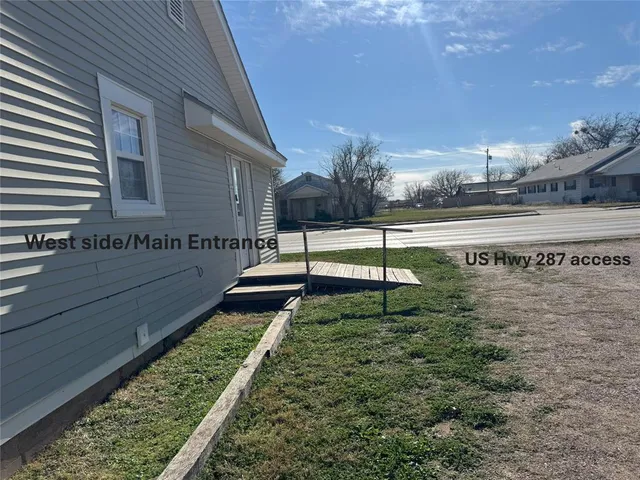 a view of a street with houses