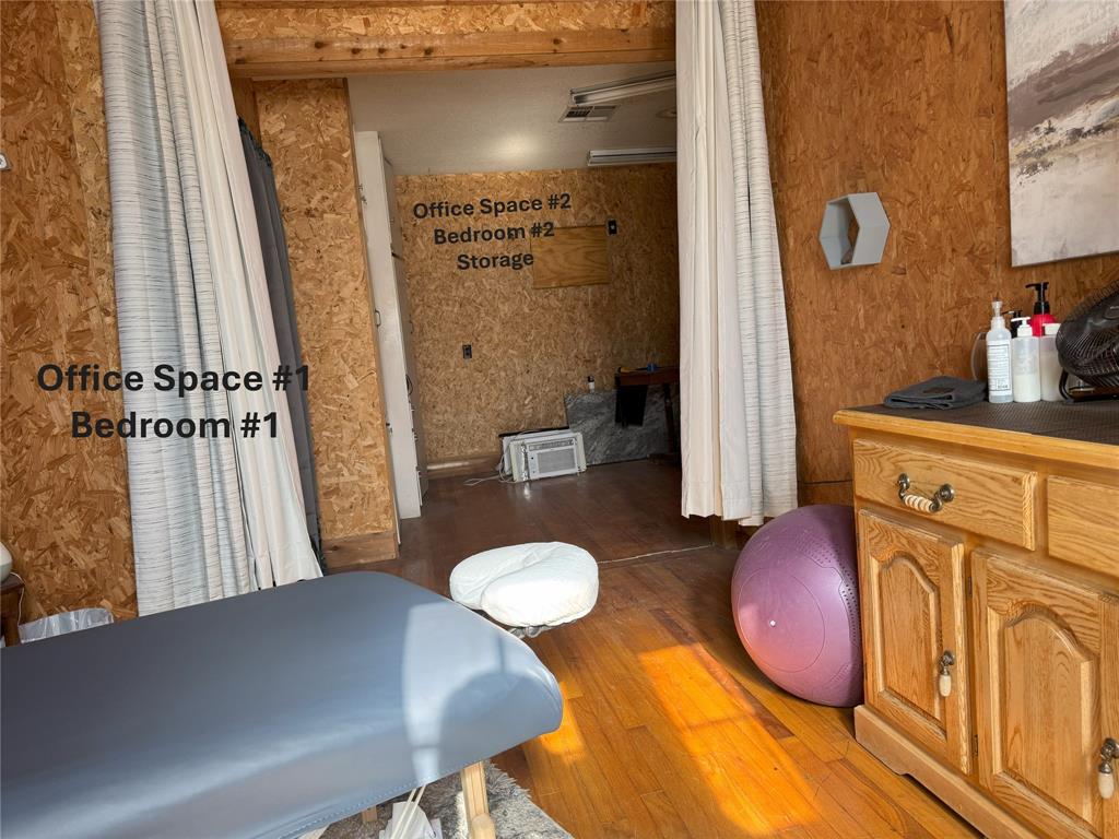 604 West 11th Street Quanah, TX 79252 - Photo 6 of 18 a living room with furniture and a table