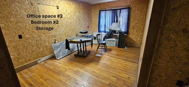 a view of a dinning room with furniture