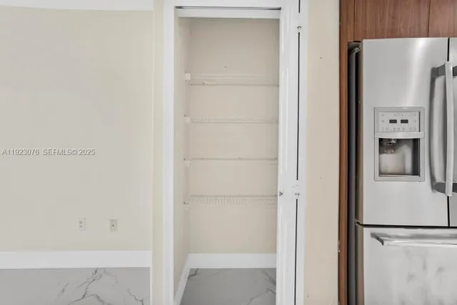 a view of a hallway with a elevator