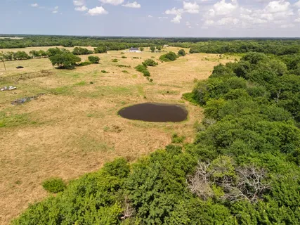 a view of an ocean beach and a building