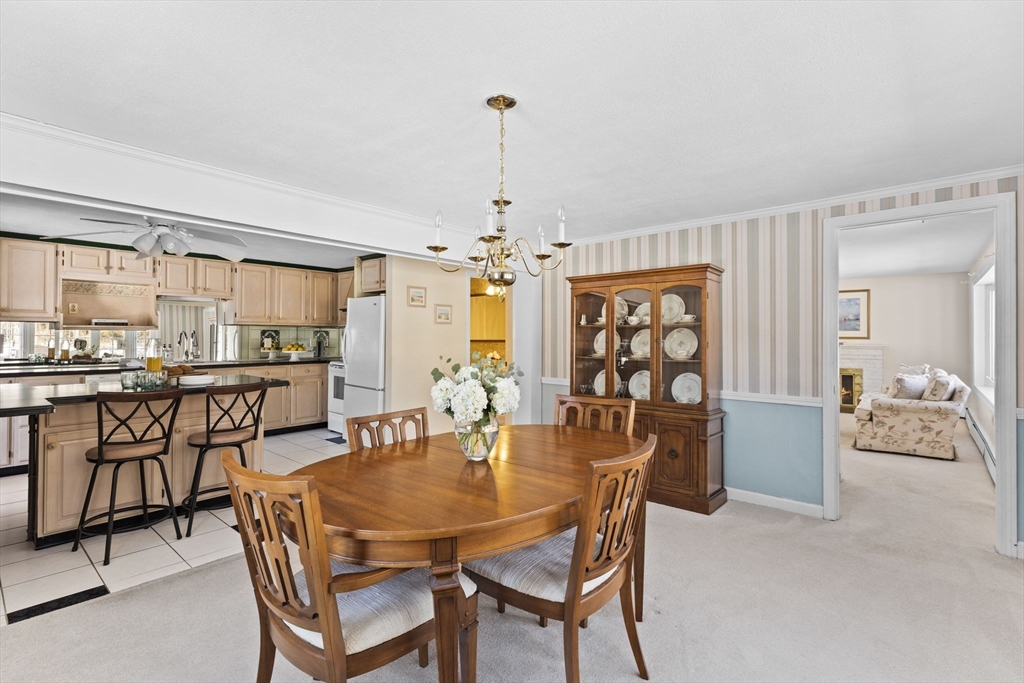 39 MacDonald Circle Walpole, MA 02081 - Photo 20 of 38 a dining room with furniture and window