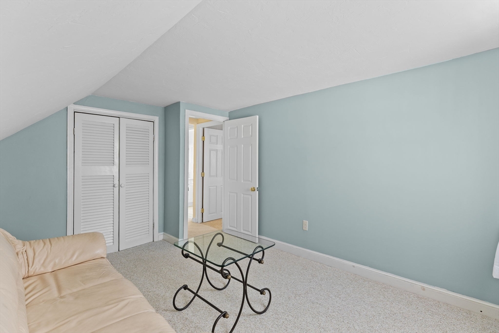 39 MacDonald Circle Walpole, MA 02081 - Photo 26 of 38 a view of a livingroom with furniture