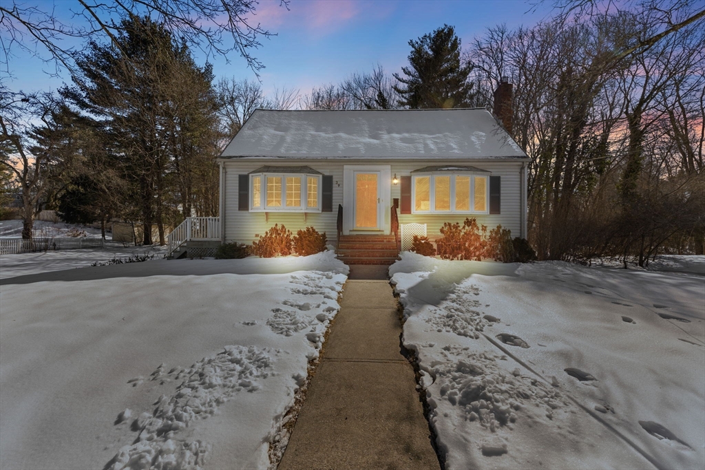 39 MacDonald Circle Walpole, MA 02081 - Photo 35 of 38 a front view of a house with a yard