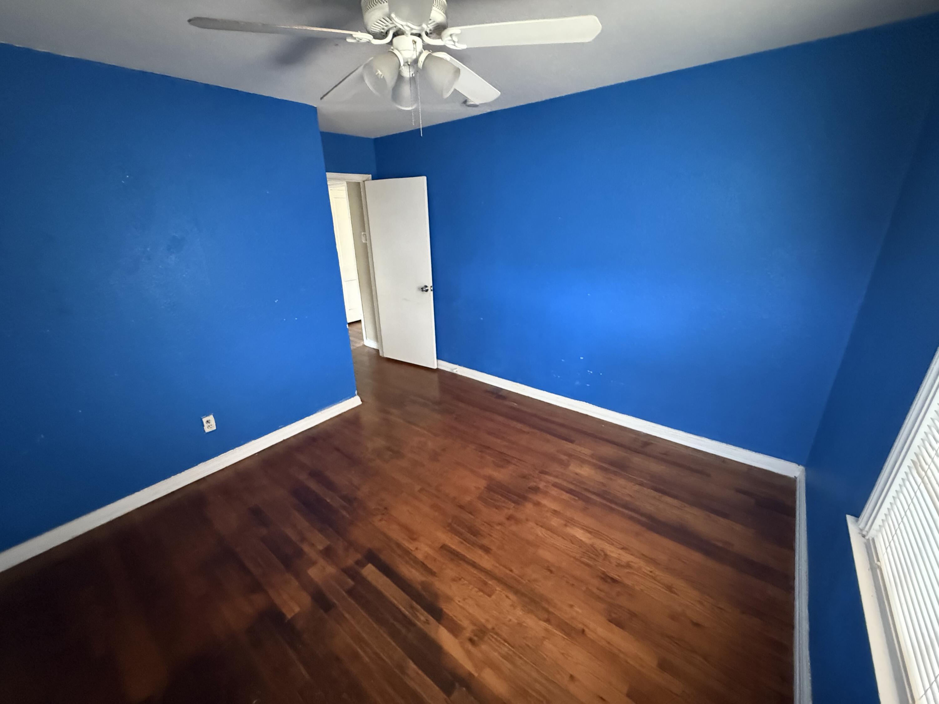 2416 31st Street Lubbock, TX 79411 - Photo 2 of 6 a view of an empty room with a window