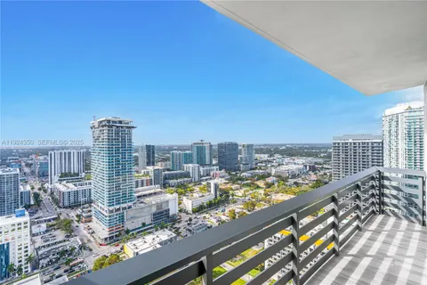 a view of a city with tall buildings