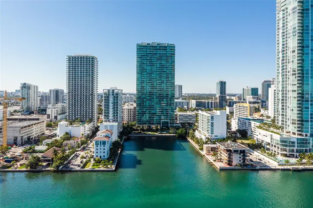 a view of a city with tall buildings