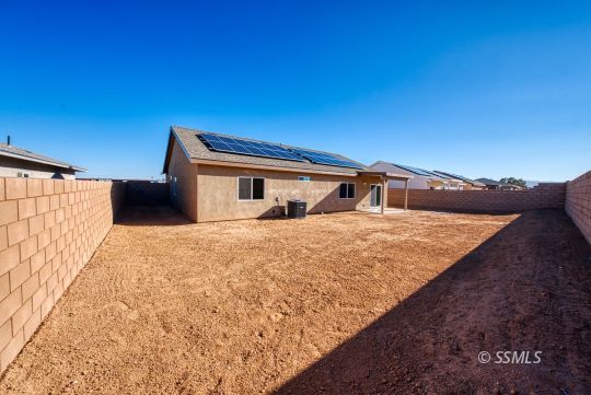 327 Abigail Street Ridgecrest, CA 93555 - Photo 32 of 35 a house view with a backyard space