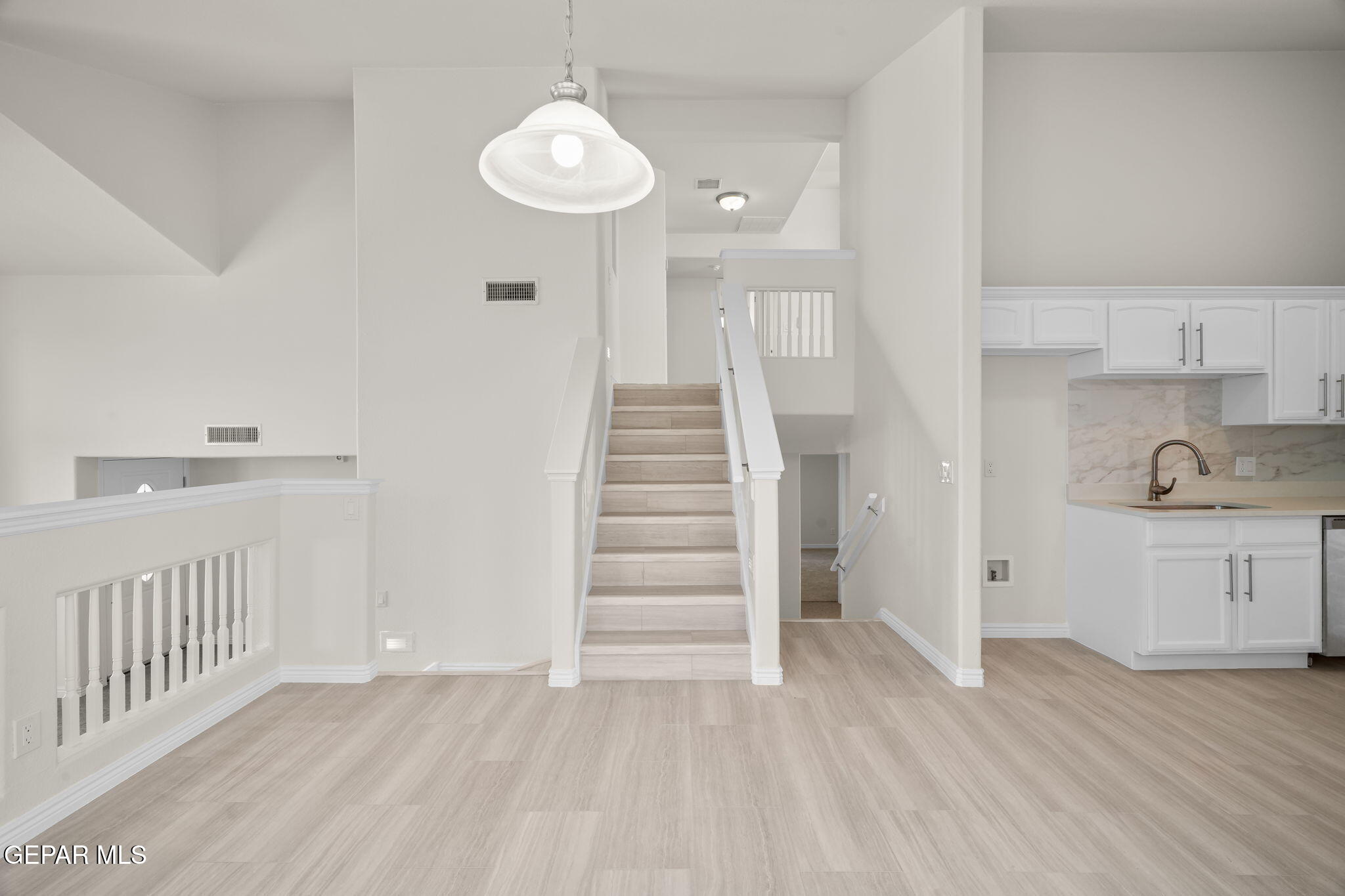 3657 Sammy Reece PIace El Paso, TX 79938 - Photo 11 of 56 a view of entryway and hall with wooden floor