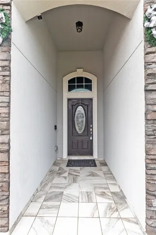 a view of entryway with washer and dryer