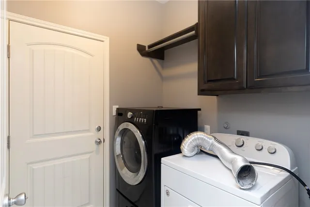 a bathroom with a tub and a sink