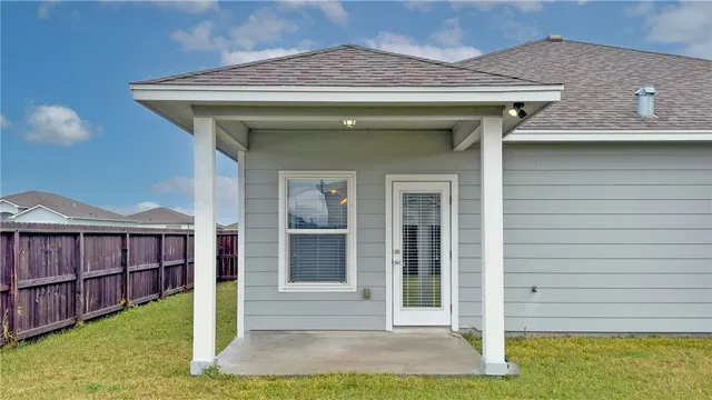 a house view with a garden space