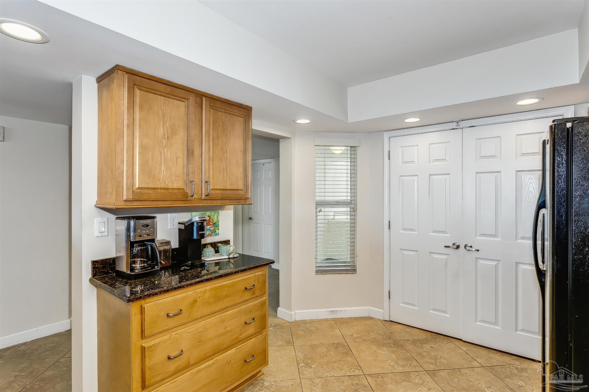 16285 Perdido Key Drive, Unit 625 Perdido Key, FL 32507 - Photo 16 of 49 a bathroom with a granite countertop sink and a mirror