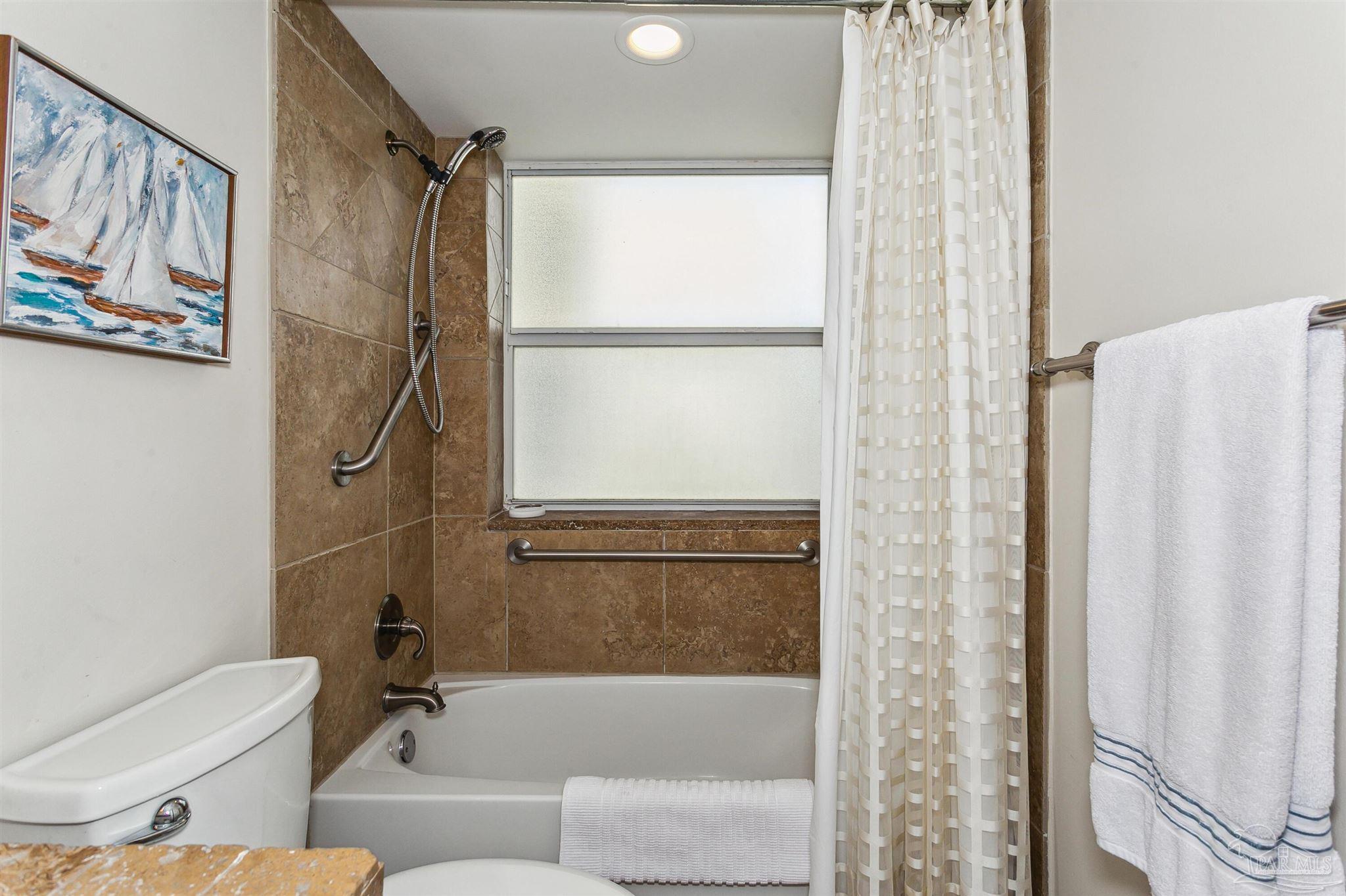 16285 Perdido Key Drive, Unit 625 Perdido Key, FL 32507 - Photo 27 of 49 a bathroom with a shower and a toilet