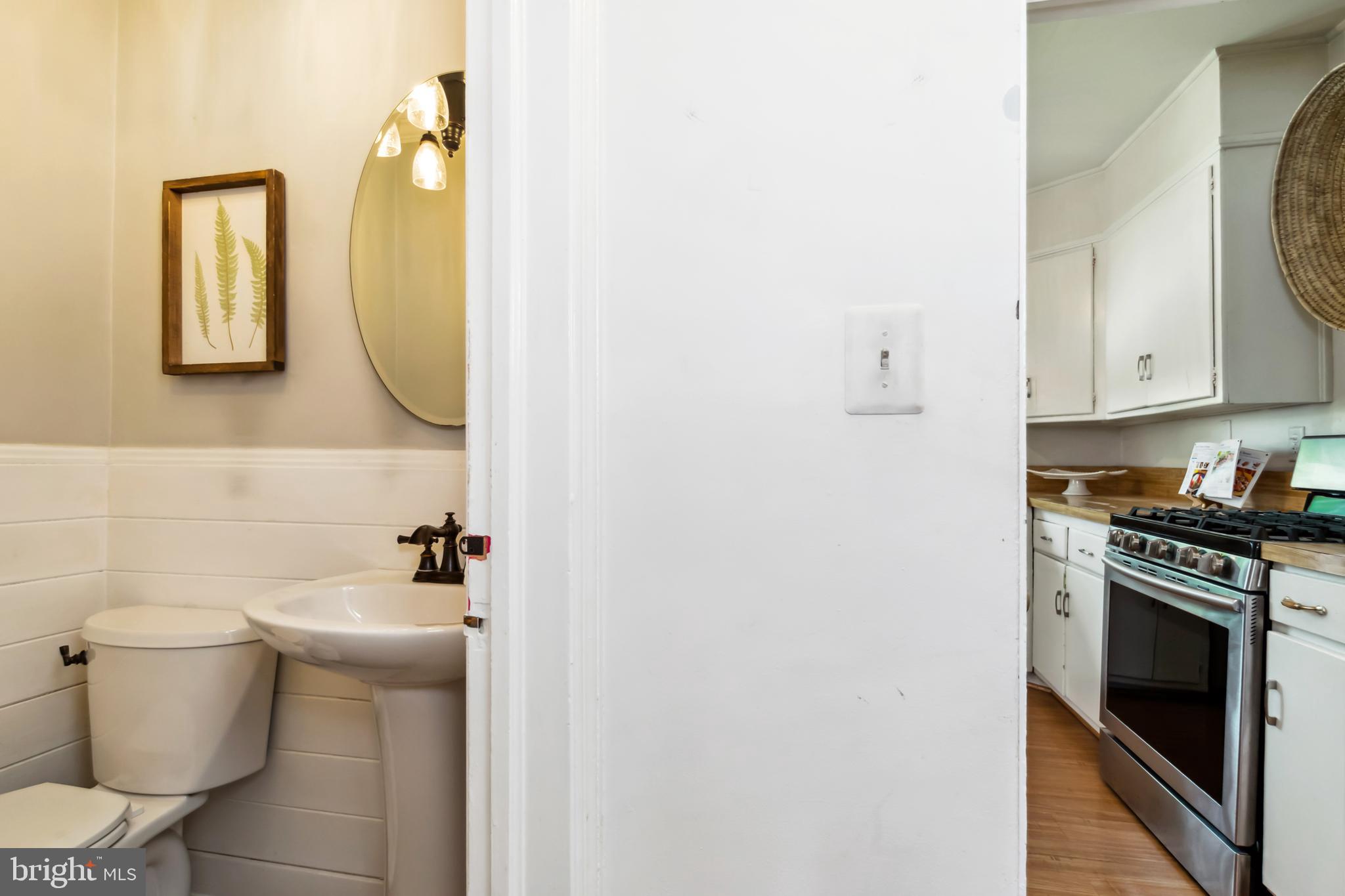 1848 Loch Shiel Road Towson, MD 21286 - Photo 9 of 25 a bathroom with a sink and a mirror