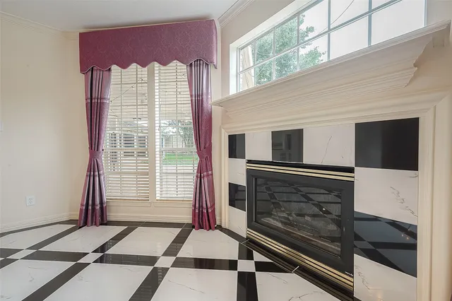a view of kitchen with furniture and refrigerator