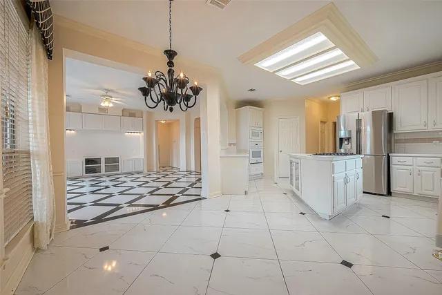 a bathroom with a sink a vanity and a mirror